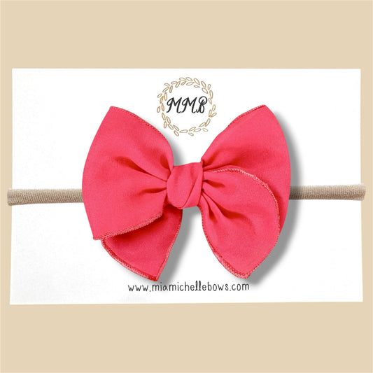 Sheer Coral Fairytale Bow