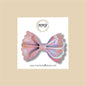 Light Pink Iridescent Scalloped Vegan Leather Bow