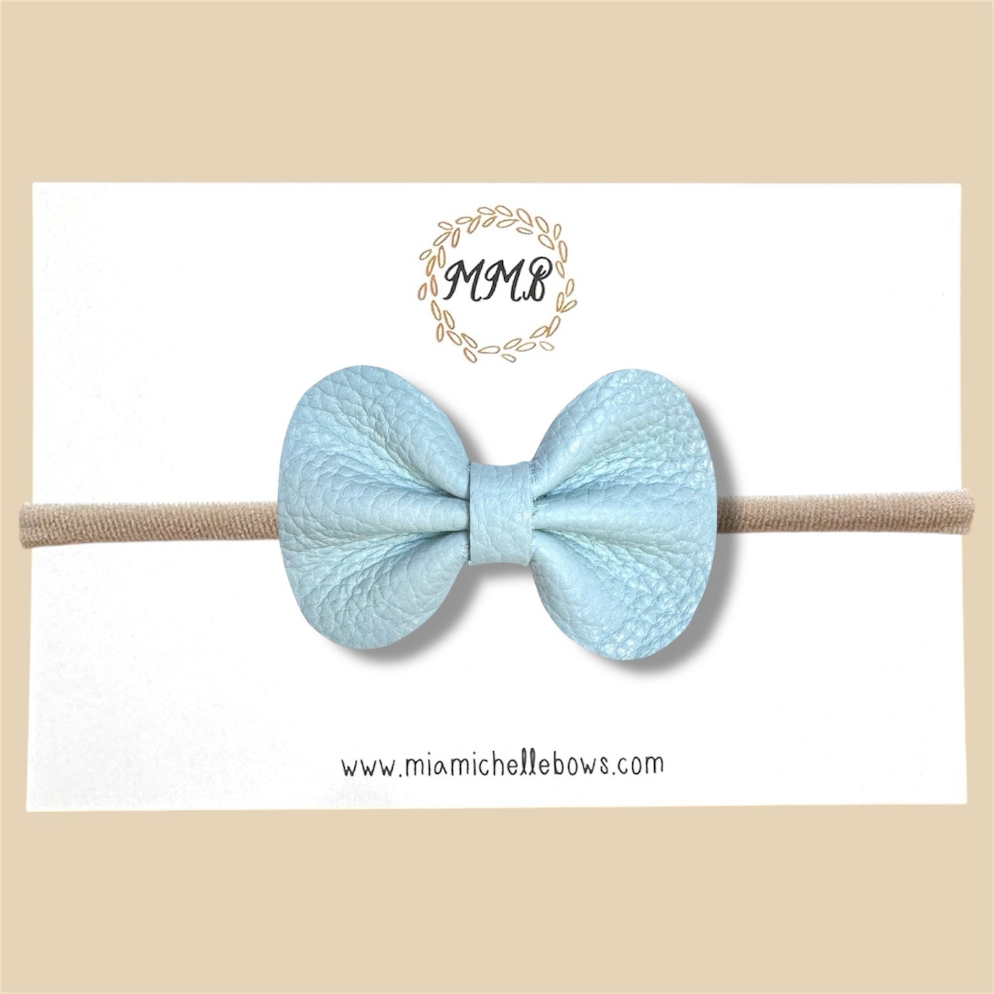 Light Blue Pebbled Genuine Leather Bow
