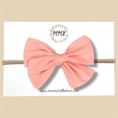 Hand-tied Peachy Pink Bow