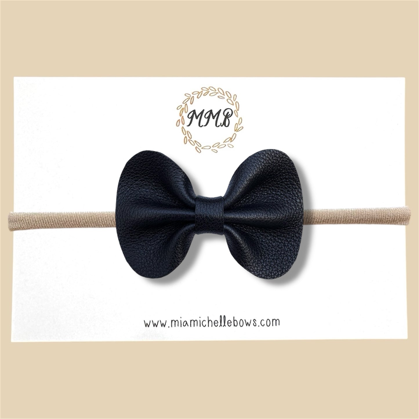 Black Pebbled Genuine Leather Bow