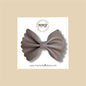 Gray Scalloped Vegan Leather Bow