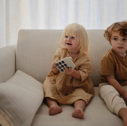 Mushie Phone Press Toy in Tradewinds