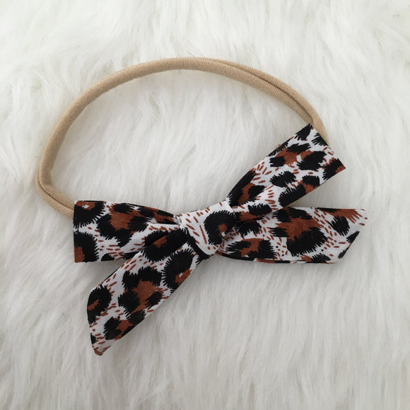 Leopard Bow in rust