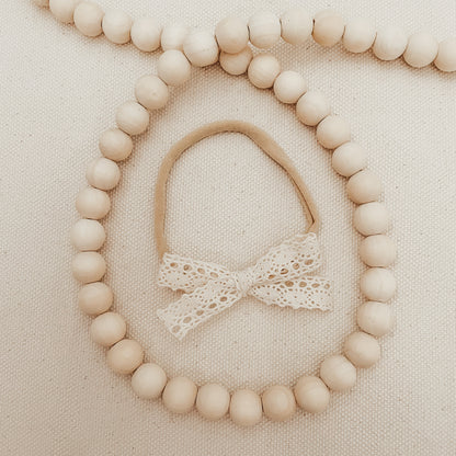 Skinny Ivory Cotton Lace Bow